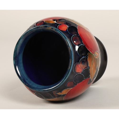 9 - Moorcroft pottery vase of baluster form, pomegranate pattern, blue signature to base, 15cm high.