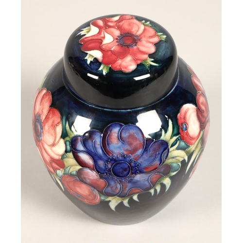 6 - Moorcroft pottery ginger jar with cover, blue ground with tube-lines stylised flowers, impressed mar... 