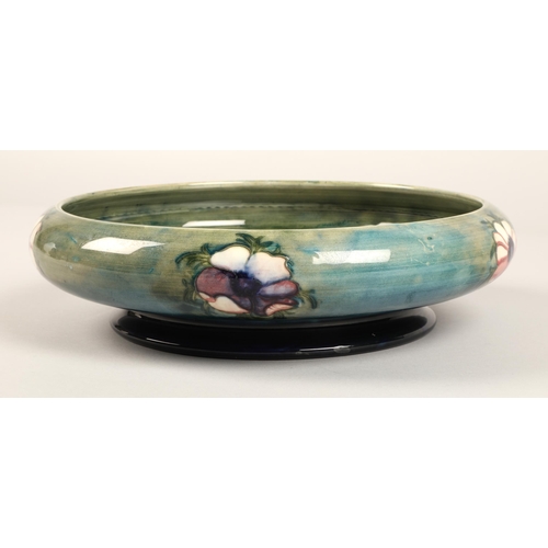 14 - Moorcroft shallow pottery bowl in the anemone pattern on blue and green ground, impressed marks and ... 