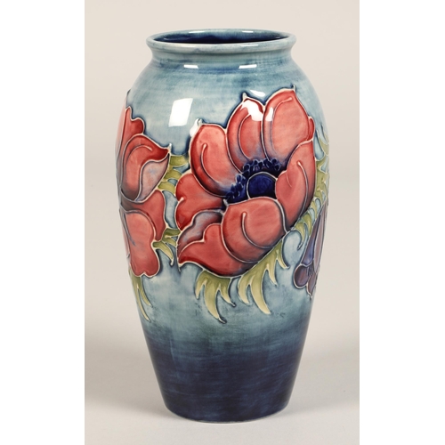 7 - Moorcroft pottery vase of baluster form, pale blue ground in the anemone pattern, impressed marks wi... 