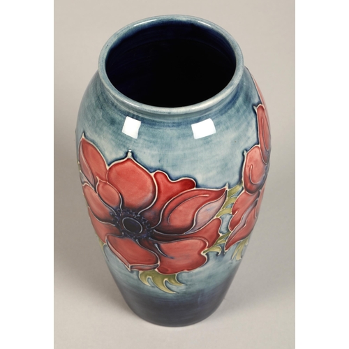 7 - Moorcroft pottery vase of baluster form, pale blue ground in the anemone pattern, impressed marks wi... 