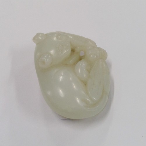 528 - Chinese Jade carved model of a cat, in pale Celadon colour, the recumbent cat with dragonfly on a le... 