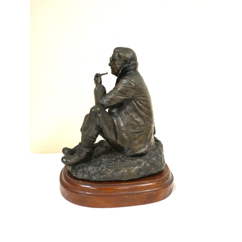 66 - WAINWRIGHT A.   Solid bronze sculpture of Wainwright, seated & holding his pipe, ltd. ed. of onl... 