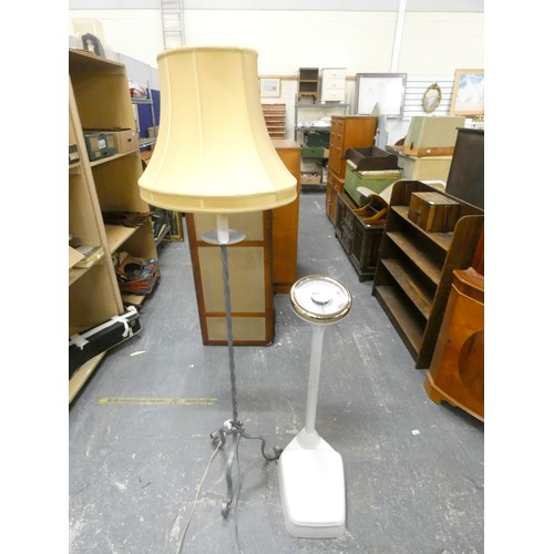 479 - Wrought iron modern standard lamp and large set of bathroom scales.