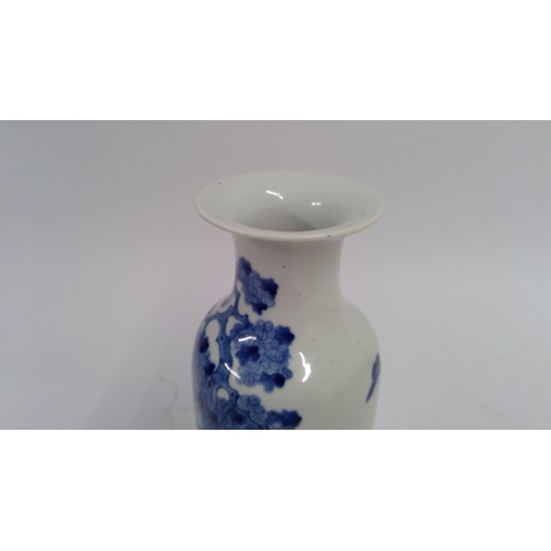 531 - Chinese blue and white porcelain baluster vase, late Qing period, the body decorated with family gar... 