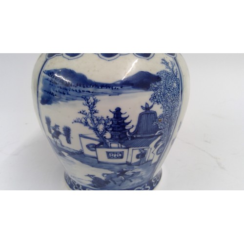 565 - 19th century Chinese blue and white jar and cover, the domed lid with teardrop finial, decorated wit... 