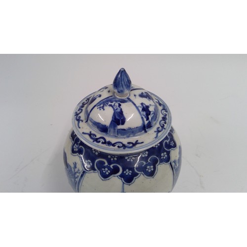 565 - 19th century Chinese blue and white jar and cover, the domed lid with teardrop finial, decorated wit... 