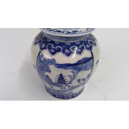 565 - 19th century Chinese blue and white jar and cover, the domed lid with teardrop finial, decorated wit... 