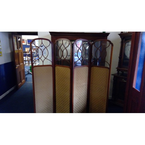 635 - Mahogany folding dressing screen, the four panels with shaped arch tops and glazed sections, H178cm.