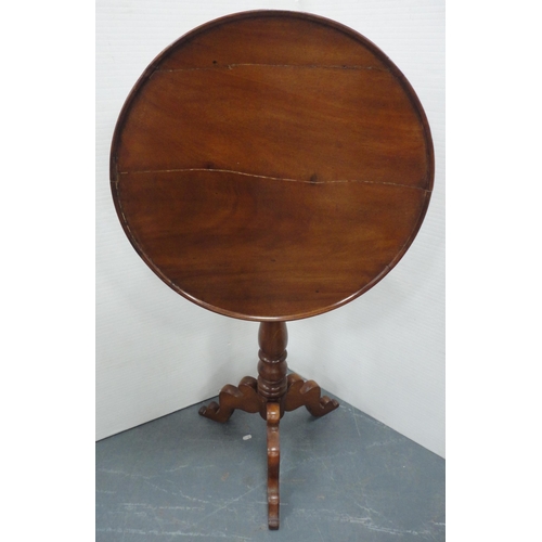 67 - George III mahogany tripod table with snap-action saucer top, 75cm high and 56cm wide.