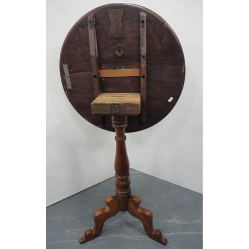 67 - George III mahogany tripod table with snap-action saucer top, 75cm high and 56cm wide.