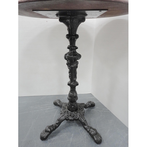 70 - Cast iron pub table, c. early 20th century, with mahogany circular top, on quadripartite supports, 7... 