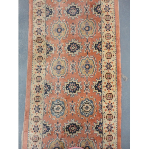 71 - Persian Kelim machine-made runner with all over geometric decoration, on a cream and rust ground, 23... 