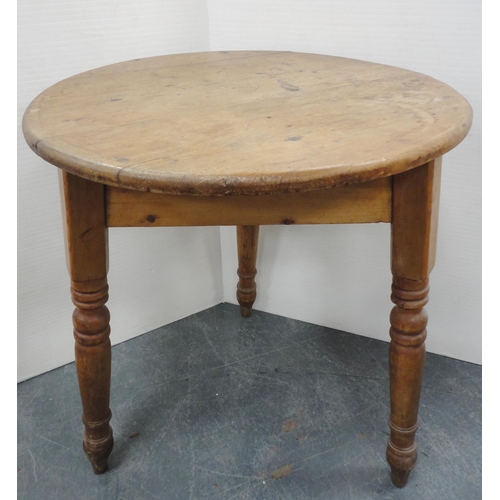 72 - Late 19th century pine cricket table, on tripod turned supports, 76cm high and 66cm wide.