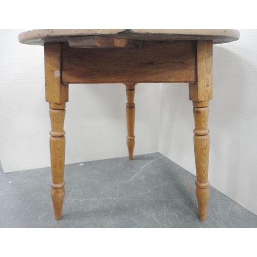 73 - Late 19th century pine cricket table, on tripod turned supports, 72cm high and 66cm wide.