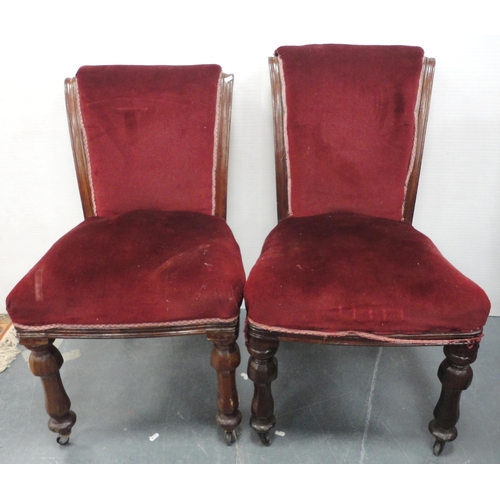 76 - Set of four Victorian mahogany dining chairs of graduated sizes, upholstered in later red velour, on... 