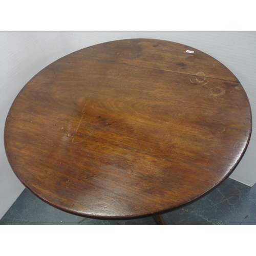 79 - George III mahogany snap-action tripod table with saucer top, approximately 70cm high.