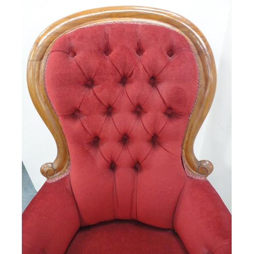 80 - Victorian mahogany framed button-back armchair, upholstered in later red Dralon, on later brass cast... 