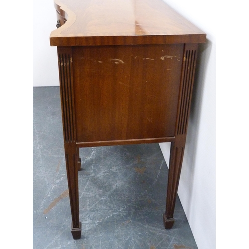 83 - Reproduction mahogany sideboard with serpentine front, fitted cutlery drawer and assorted cupboard d... 