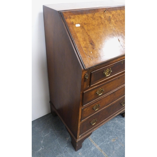 84 - Lady's burr walnut bureau with fall front enclosing fitted drawer, cupboard and pigeonholes above fo... 