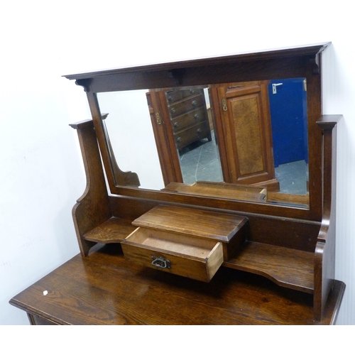 87 - Oak dressing chest, c. early 20th century, with two short and three long drawers, swing mirror above... 