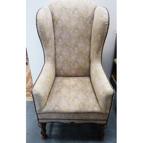 90 - William & Mary-style wing back armchair, c. early 20th century, upholstered in later studded flo... 