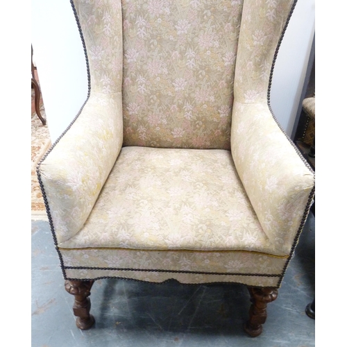 90 - William & Mary-style wing back armchair, c. early 20th century, upholstered in later studded flo... 