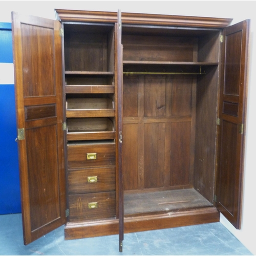 95 - Late Victorian walnut wardrobe by Wylie & Lochhead of Glasgow, with mirrored section flanked by ... 