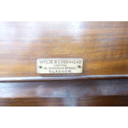 95 - Late Victorian walnut wardrobe by Wylie & Lochhead of Glasgow, with mirrored section flanked by ... 