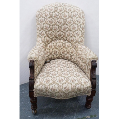 113 - Victorian mahogany-framed armchair, upholstered in later floral stuff-over fabric, on turned support... 