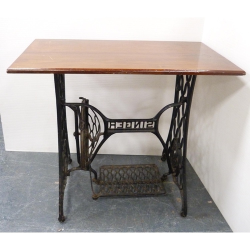 114 - Cast iron Singer sewing machine base, with later top, 74cm high and 87cm wide.