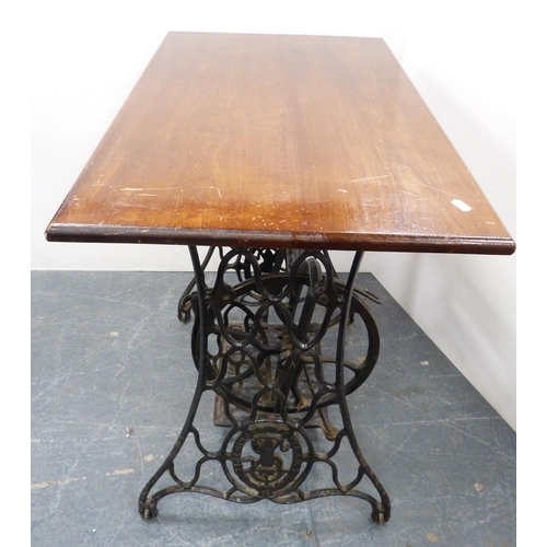 114 - Cast iron Singer sewing machine base, with later top, 74cm high and 87cm wide.