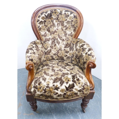 115 - Victorian mahogany-framed armchair, upholstered in later button-back floral stuff-over fabric, scrol... 