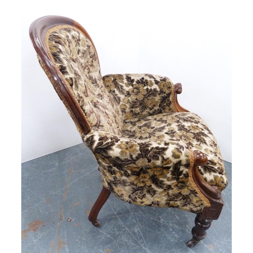 115 - Victorian mahogany-framed armchair, upholstered in later button-back floral stuff-over fabric, scrol... 