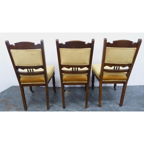 117 - Three matching mahogany dining chairs, c. early 20th century, upholstered in later mustard stuff-ove... 