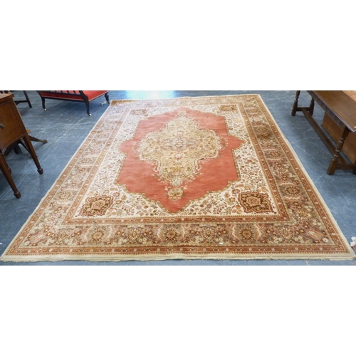 125 - Large Aubusson-style machine-made carpet with Persian influence, with large floral medallion to the ... 