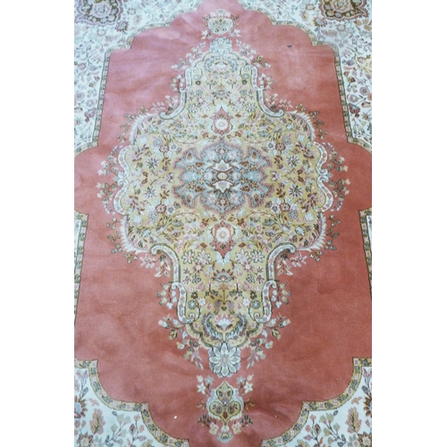 125 - Large Aubusson-style machine-made carpet with Persian influence, with large floral medallion to the ... 