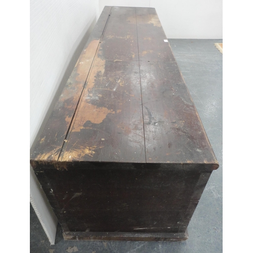 129 - Victorian farmhouse pine storage box with hinged cover, 50cm high, 194cm wide and 50cm deep.