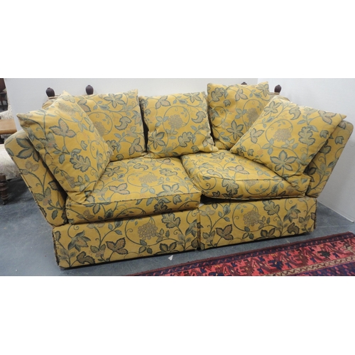 131 - Knole-style sofa upholstered in gold-coloured fabric decorated with leaves, with ties and cushions, ... 