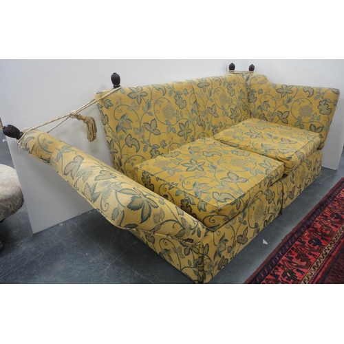 131 - Knole-style sofa upholstered in gold-coloured fabric decorated with leaves, with ties and cushions, ... 