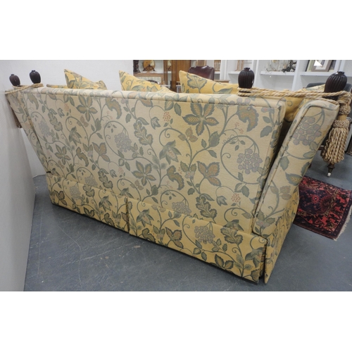 131 - Knole-style sofa upholstered in gold-coloured fabric decorated with leaves, with ties and cushions, ... 