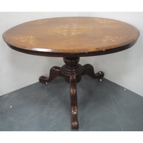 134 - Victorian inlaid walnut loo-type table with oval top, on turned column and tripod scroll supports an... 