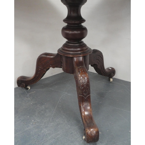 134 - Victorian inlaid walnut loo-type table with oval top, on turned column and tripod scroll supports an... 