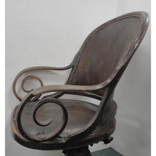 137 - 19th century bentwood and ash swivel captain's chair by Heywood Bros & Co., Chicago, with scroll... 