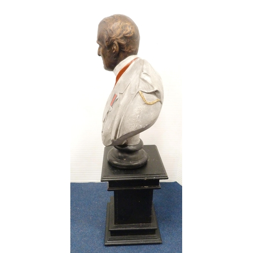 33 - Painted plaster bust modelled as the Duke of Wellington in uniform, on ebonised socle base and eboni... 