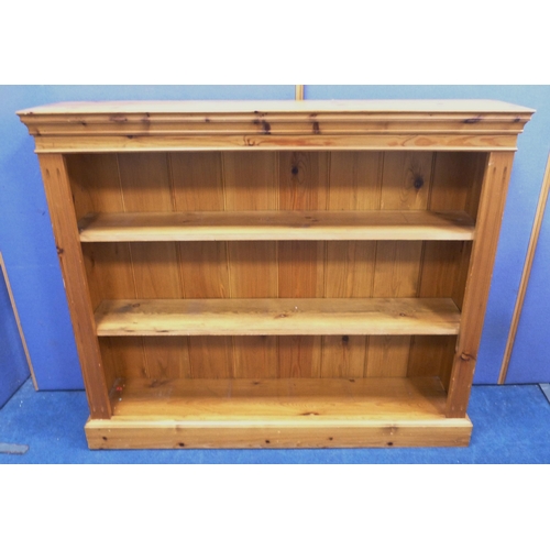 96 - Modern pine open bookcase, 106cm high, 126cm wide, and 26cm deep.