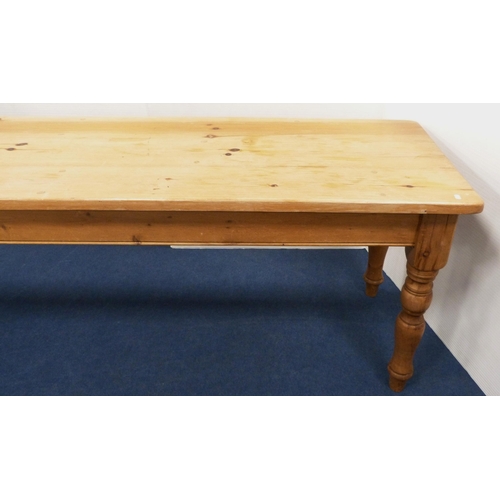 98 - Pine refectory-type dining table on turned supports, 77cm high, 214cm long and 66cm wide.