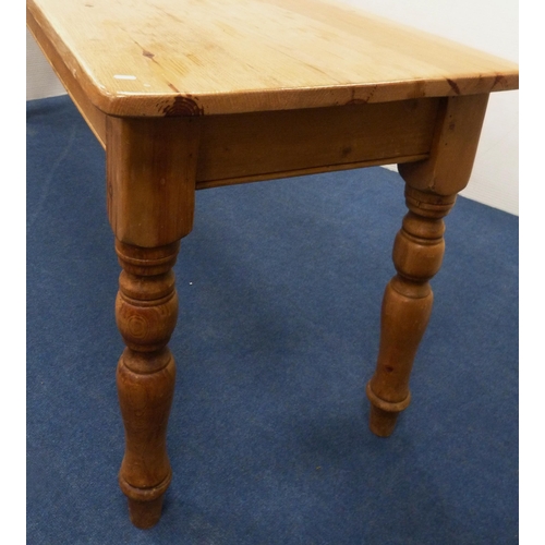 98 - Pine refectory-type dining table on turned supports, 77cm high, 214cm long and 66cm wide.