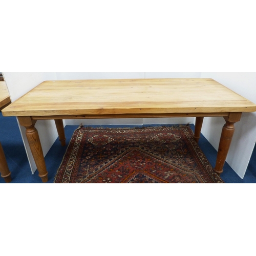 99 - Pine refectory-type dining table on turned supports, 76cm high, 182cm long and 83cm wide.