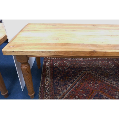 99 - Pine refectory-type dining table on turned supports, 76cm high, 182cm long and 83cm wide.